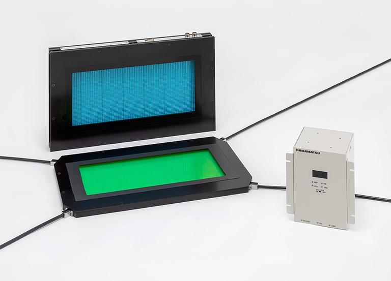 Pinhole inspection unit C15477 (right), light source unit L12057 series (left back) and light collector unit A12159 series (left front)