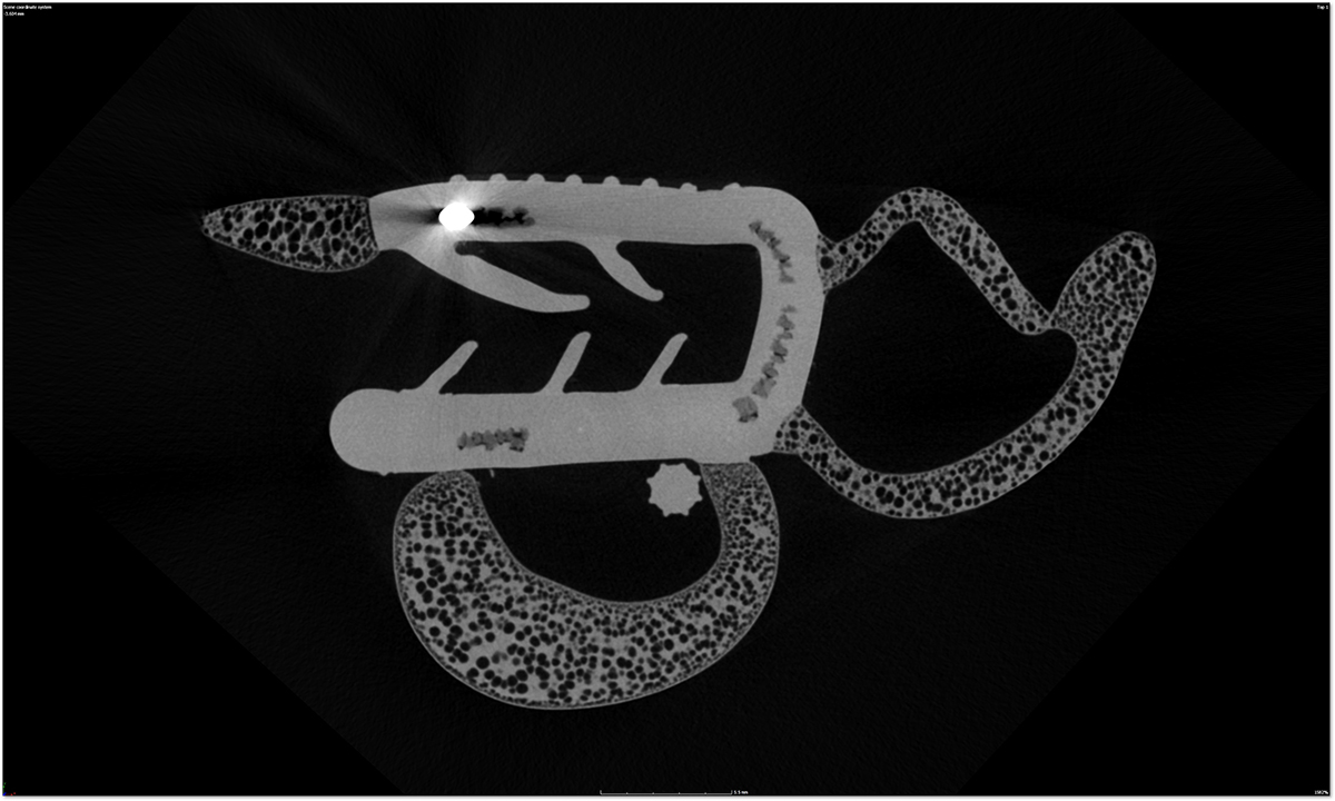 Cross-sectional CT image of an object composed of a porous region