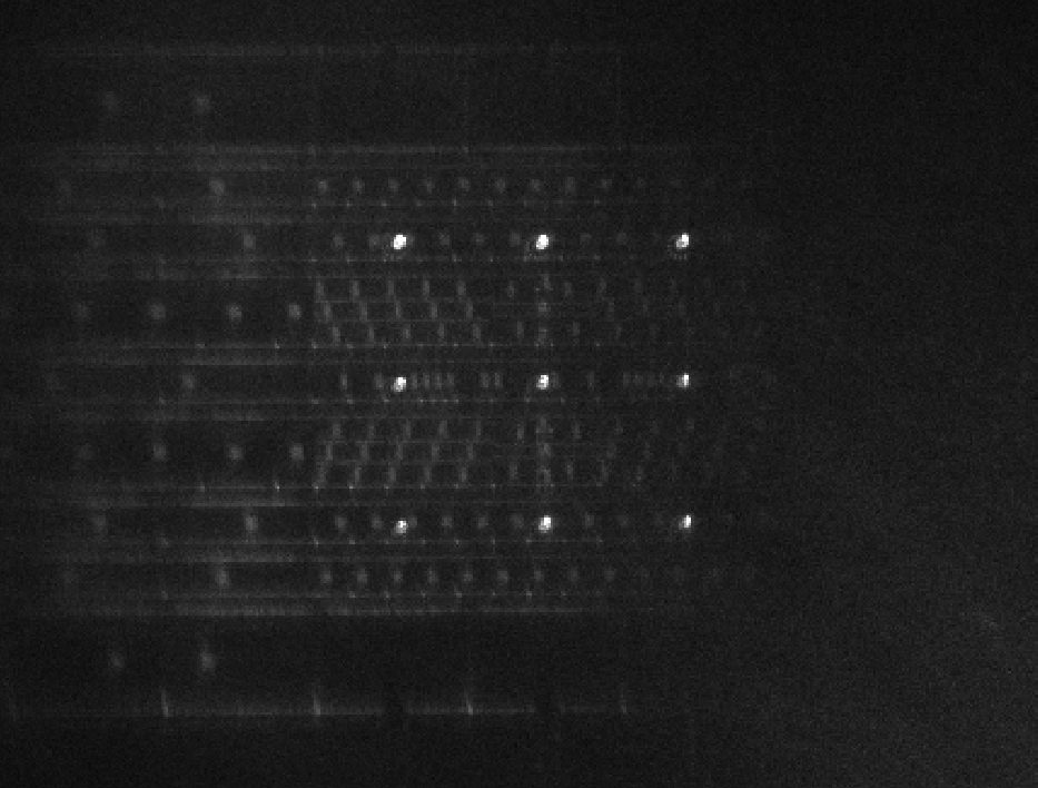 3x3 Array of Trapped Ions in ZuriQ's quantum architecture demonstrated in collaboration with ETH Zurich. 