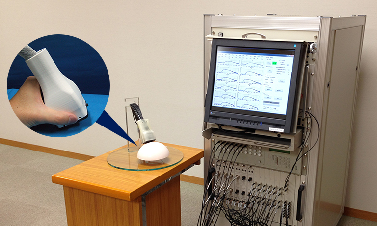 optical mammography and the hand-held probe
