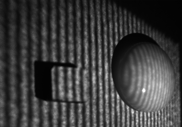 Fig. 11 Switching of fringe projections